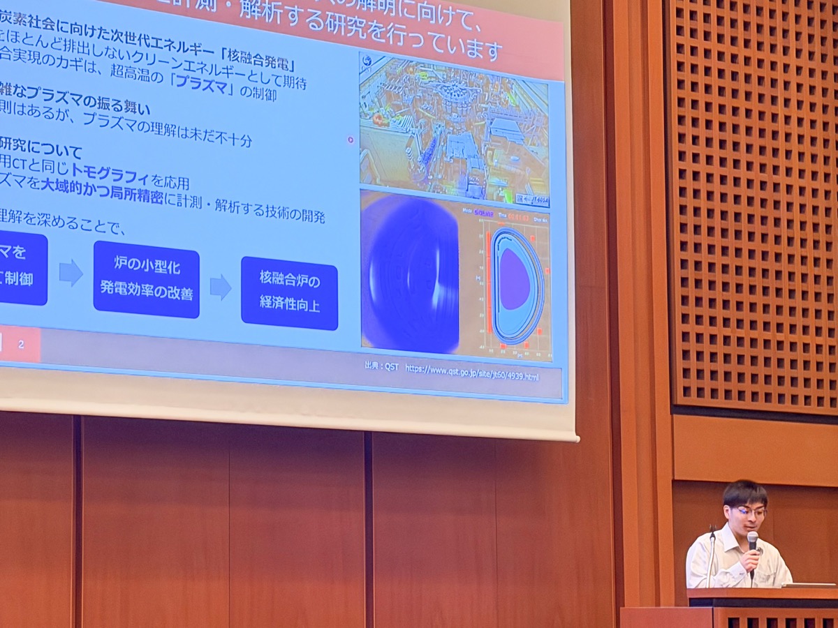 Yuki Nishimura presenting his doctoral research at the 21st Q-DeCS Workshop